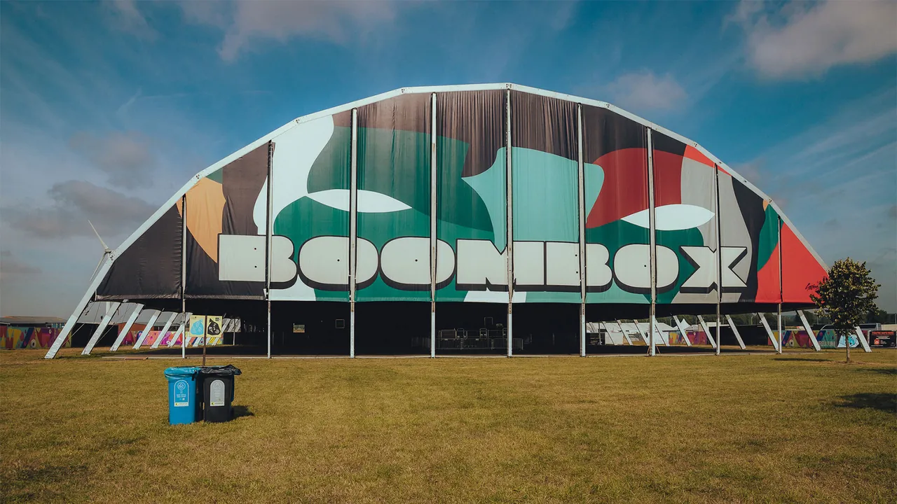 The Boombox tent and its painted facade by day, before the shows start.