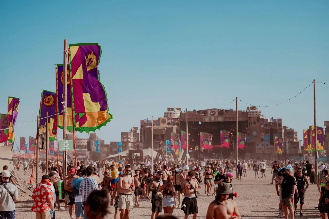 The walkways and their flags, with the Sound System Temple in the background.